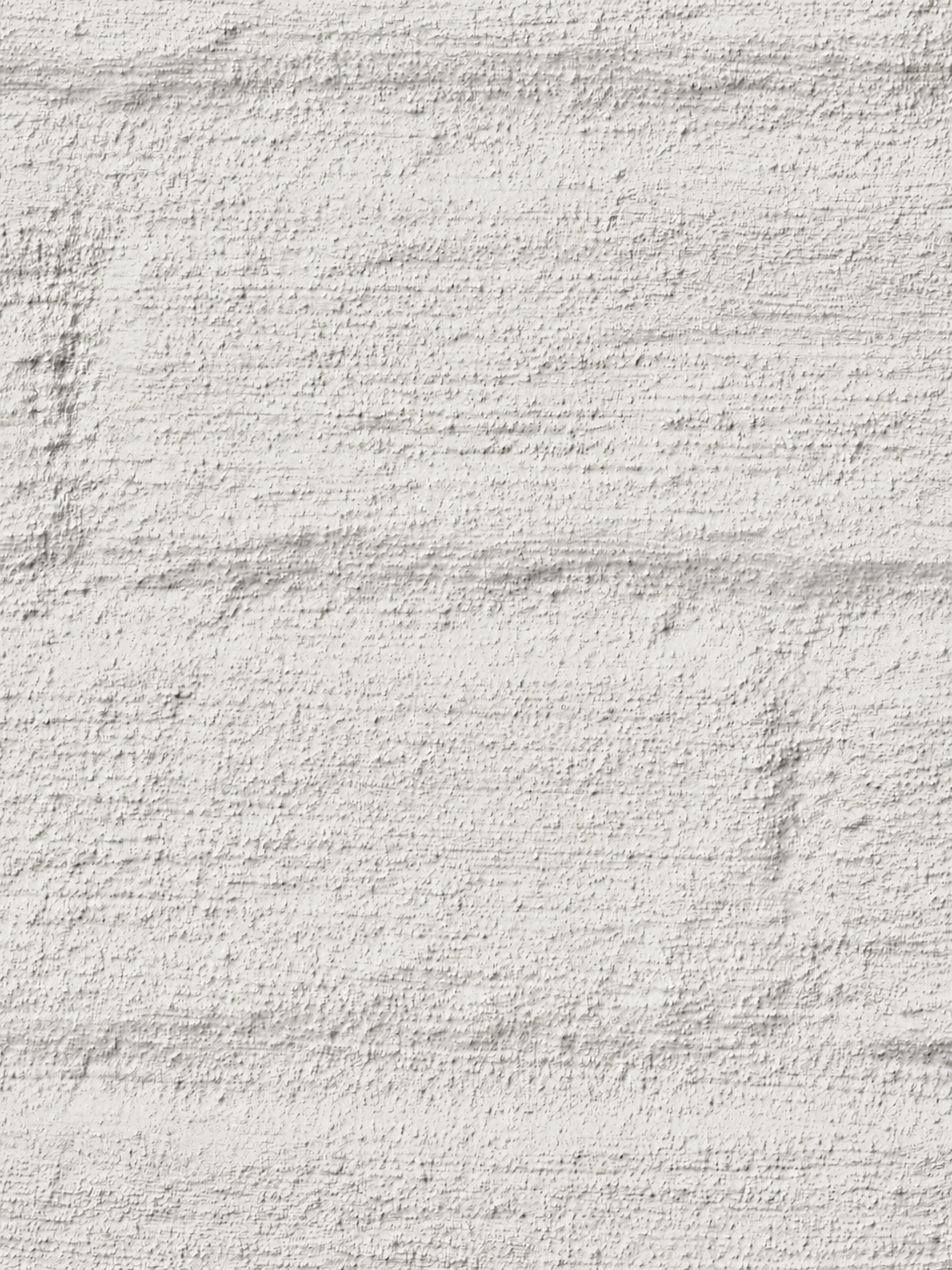 Detail van een wit gekaleide gevel met zichtbare handmatige textuur